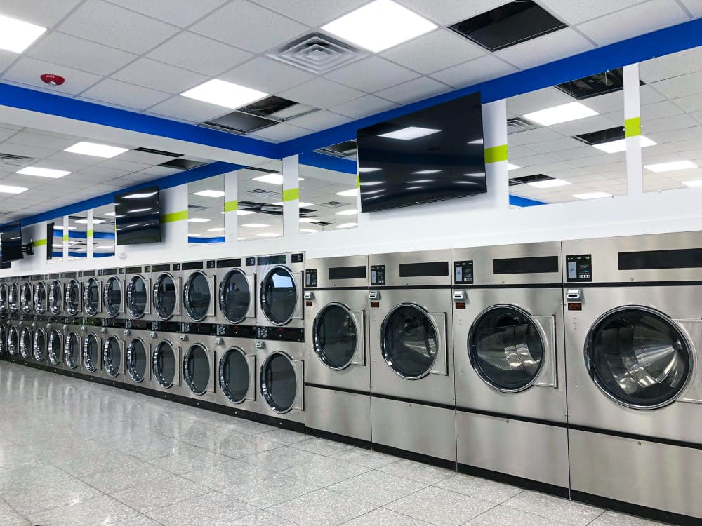 Modern laundromat interior with washing machines